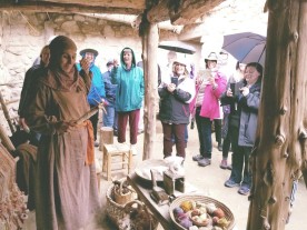 Hannah demonstrates first century weaving