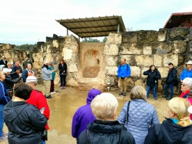 After the arrival of Christianity, part of the old Roman bathhouse was converted to a church. Note the cross fresco on the baptism pool.