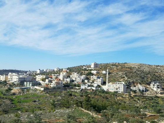 A Palestinian village north of Jerusalem. Note the minaret right of center.